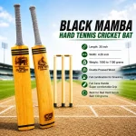 Black Mamba Hard Tennis Cricket Bat displayed on a professional cricket pitch with hard tennis balls